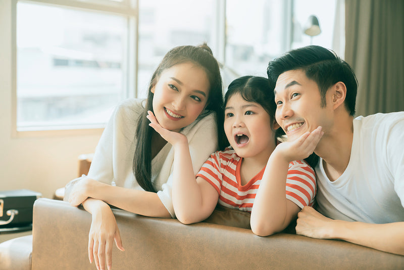 Happy healthy Asian family